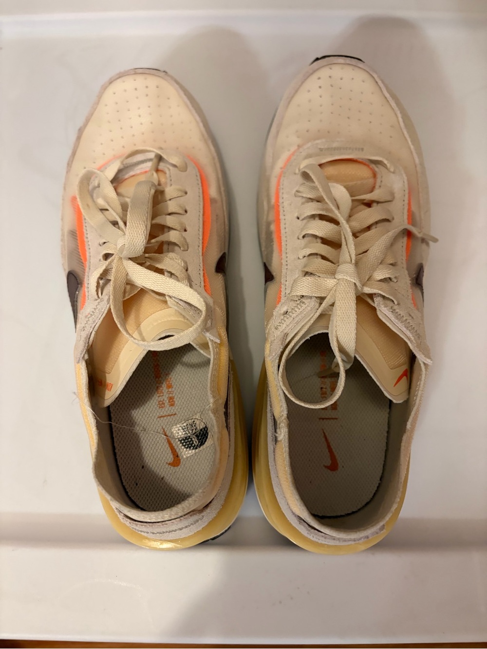 Nike Men’s Cream Sneakers with Orange Accents